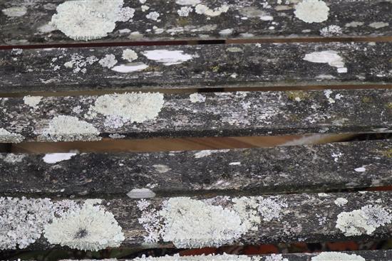 A weathered teak six piece garden furniture set Benches 150cm